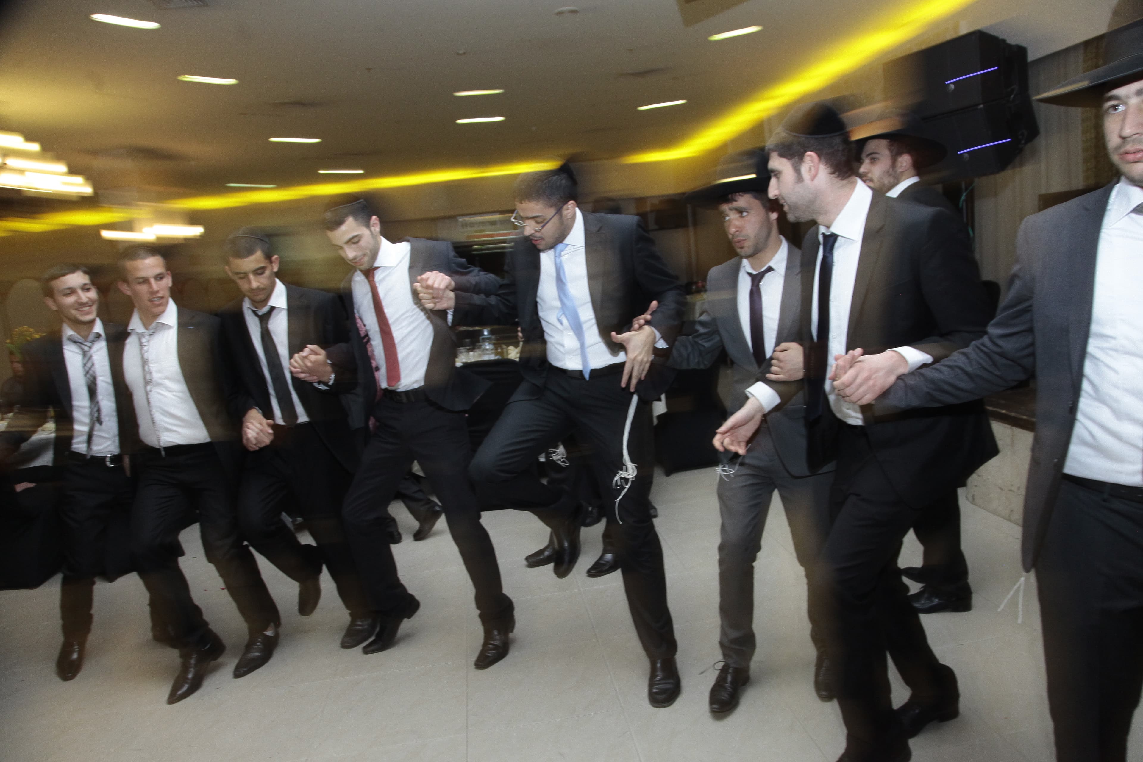 Traditional Jewish wedding dancing photography