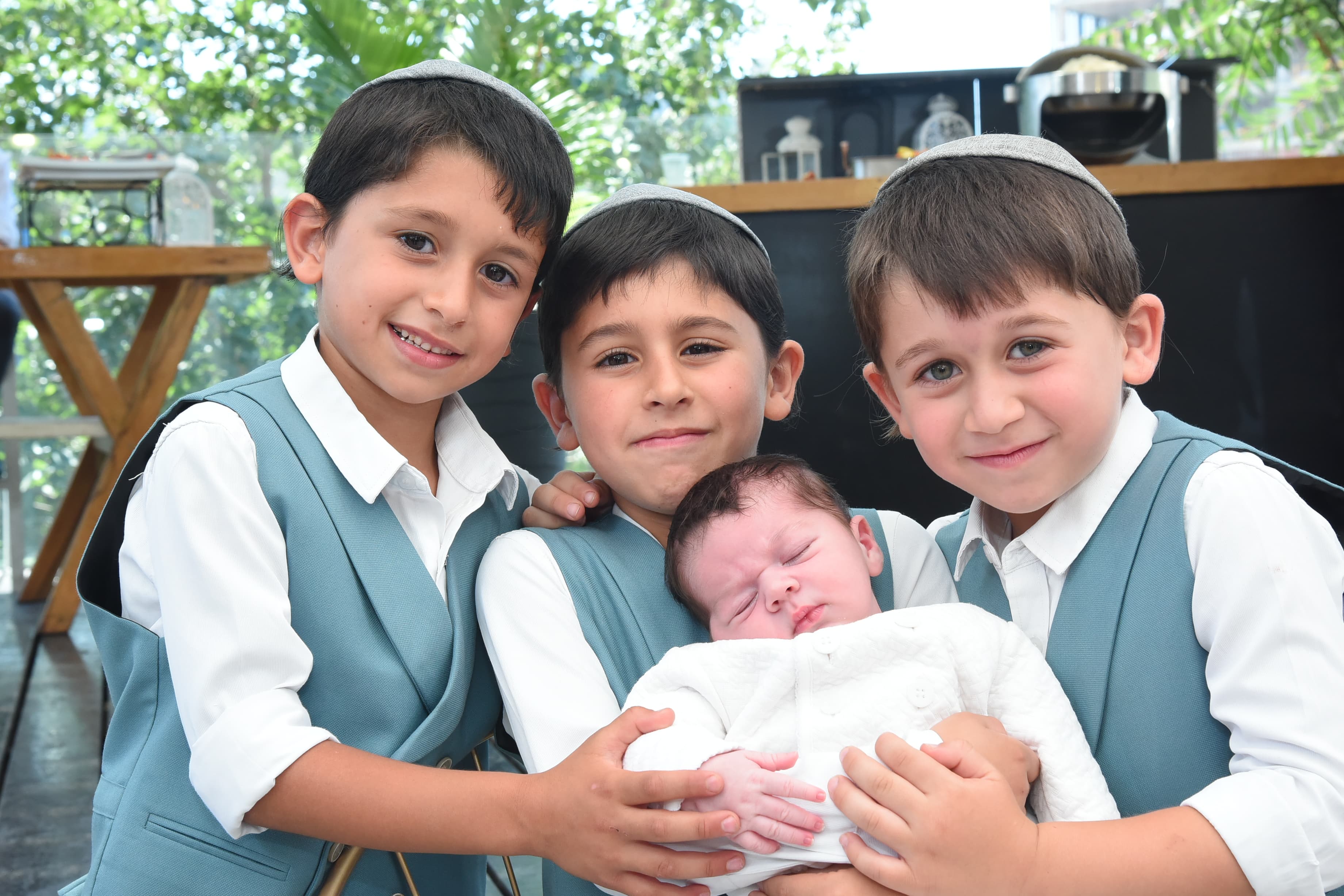 Family moments before a Brit Milah ceremony